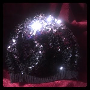 Variegated bebe black and silver sequin knit cap